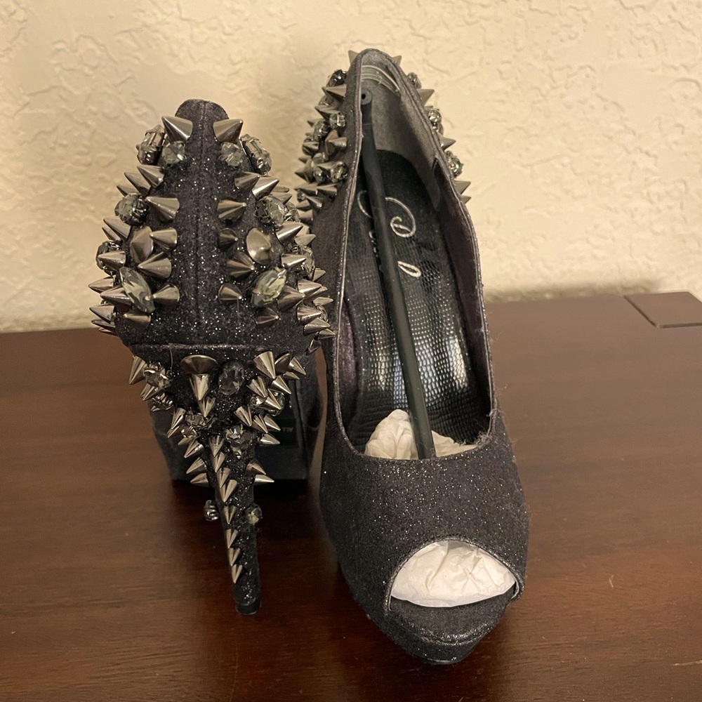 Spiked, black heels